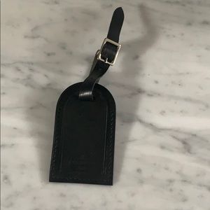 Louis Vuitton. Black, luggage tag, used